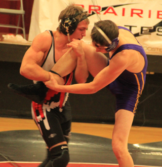 Hunter McWilliams lifts his opponents leg and is about to score a takedown at the home meet last Tuesday.