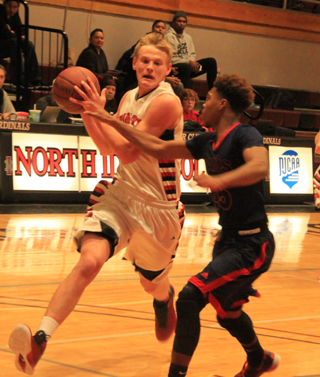 This is just after the photo above as Jake Bruner goes for a lay-up. He got fouled on the play.