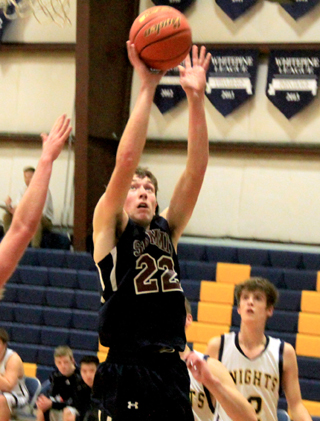 Summits Patrick Chmelik scores 2 of his 20 points. He came up big on the boards in Summits 4th quarter rally.