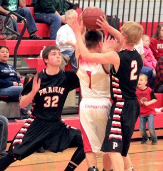 John Mager and Rhett Schlader double team a C.V. ballhandler.