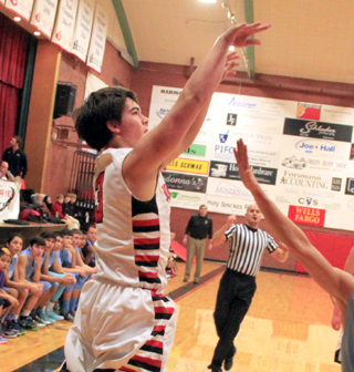 Terran Peery shoots from the corner against Lapwai.