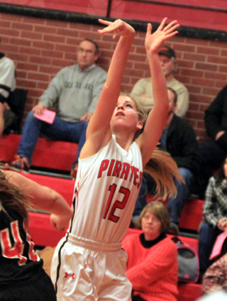 Chaye Uptmor puts up a shot from the outside against Troy.