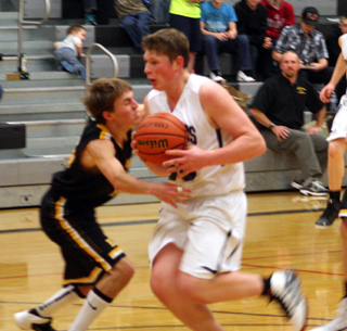 Chris Osborne is headed for a game-tying lay-up that would send Summits game against Highland into overtime.