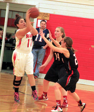 After C.V.s Felicia Reuben connected on two 3-pointers early in the second quarter, Prairie changed up their defense to shut her down. Here Kayla Schumacher and Krystin Uhlenkott doubleteam her and force a pass.