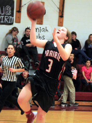 Angela Wemhoff scores on a lay-up at Kamiah.
