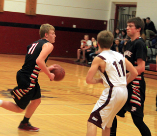 John Mager sets a pick for Jake Bruner in the Kamiah game.