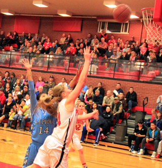 Kayla Schumacher shoots against Lapwai.