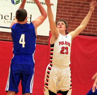 Lucas Arnzen bothered Genesees Beau Tilleman enough to make him miss this shot attempt.