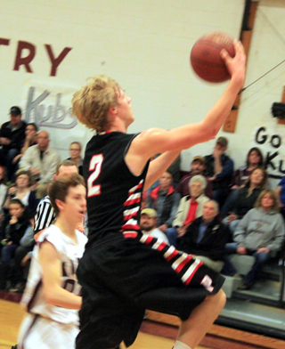Rhett Schlader broke a shooting dry spell at Kamiah with this lay-up late in the first half and went on to score 19 in the second half.