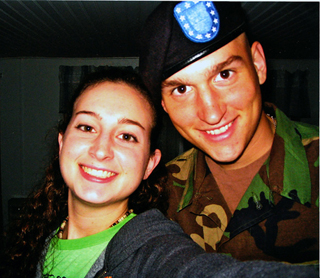 At right is Ross McGinnis, subject of Lustig's speech.