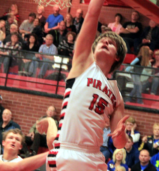 Tanner Ross scores on a lay-up against Genesee.
