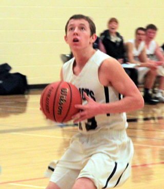 Thomas Schwartz is about to shoot a lay-up after making a steal.