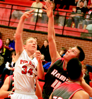 Devin Bruegeman tosses up a 1-hander against C.V.