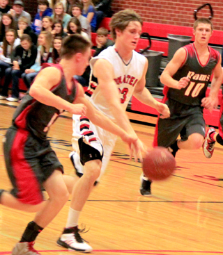 Lucas Arnzen drives past the 3-point line after a C.V. turnover.