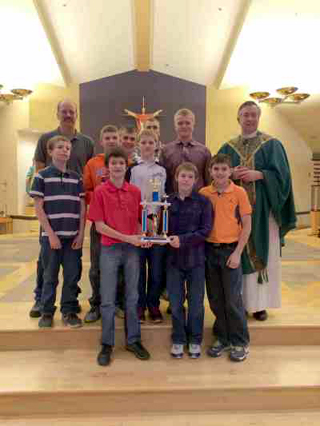 The team with the Sportsmanship Trophy and new Bishop Peter F. Christensen.
