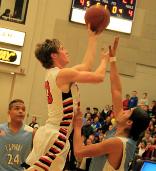 Lucas Arnzen gets a shot up against Lapwai.