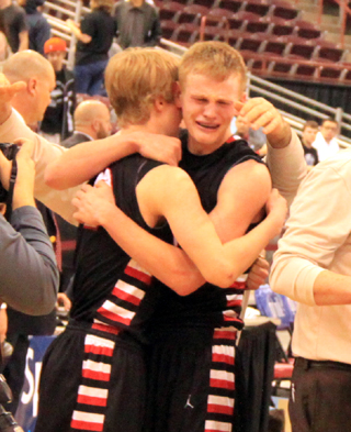 Jake Bruner appears to be overcome by emotion as he and Rhett Schlader hug after Prairie's win over Lapwai.