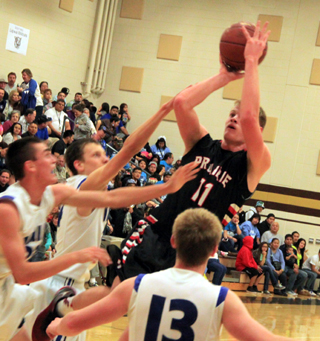 Jake Bruner puts up a fallaway jumper against Valley.