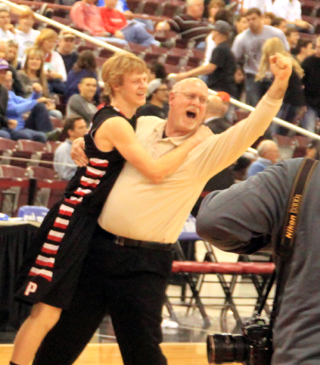 Father and son, Scot and Rhett Schlader celebrate after the win.