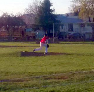 Daniel Mager pitches against Highland. Photo by John Mager Sr.