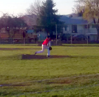 Daniel Mager pitches against Highland. Photo by John Mager Sr.