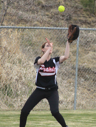 Abbie Uhlenkott has to recatch this fly ball for an out against Troy as it had bounced up in the air off the heel of her glove.