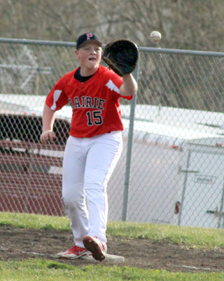 Dereck Arnzen is about to catch the ball at first for an out in the C.V. game.