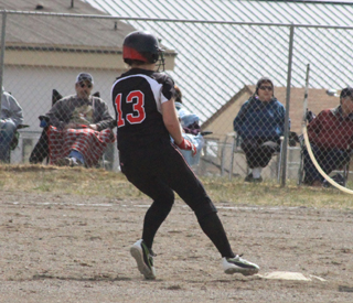 Sam Remacle pulls into second with a double against North Fremont.