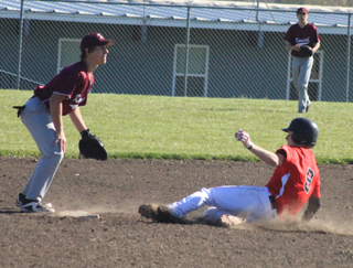 Devin Bruegeman steals second against Kamiah.