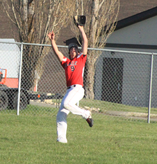 Terran Peery had an adventure catching a fly ball in center against Genesee. He made the catch and wound up tumbling to the ground.
