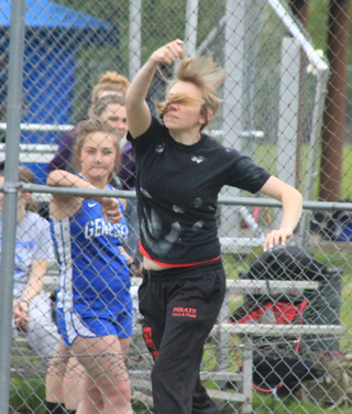 We're not sure Bailey Gehring knows where her discus landed as her hair gets in her face after the release.