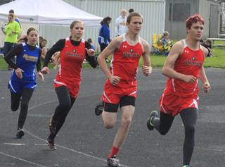 Due to a lack of participants the boys and girls 800s were run together. Prairie athletes from left are Chaye Uptmor, who won the girls event and Anthony Karel and Dally Ratcliff who finished third and second respectively.
