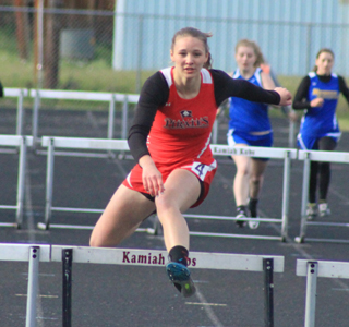 Mykaela McWilliams has more than a full hurdle lead on the rest of the field in the 300 hurdles. Hurdles are nearly 30 meters apart for this race.