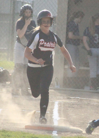 Kylie Tidwell with one of her 3 hits against Genesee.