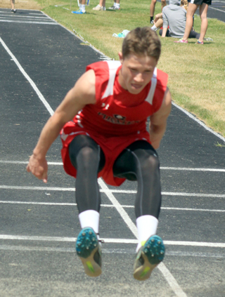 Luke Wemhoff in the long jump at the Meet of Champions.