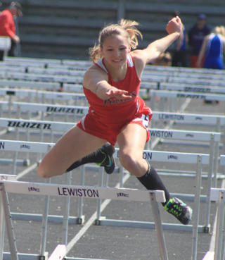 Mykaela McWilliams was among the leaders in the 100 hurdles when she crashed on the final hurdle. She wound up 9th and skinned both knees.
