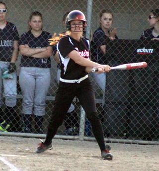 Sarah Seubert watches the ball for a second after connecting for turned out to be a triple against Genesee.