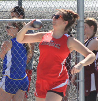 Beth Dinning competes in the shot put at regionals.