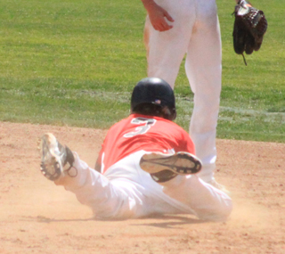 Besides pitching Daniel Mager was the hitting star in the first Potlatch game as he makes a head first slide into second with a double.