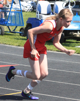 Delaney Uhlenkott gets out of the blocks in the 400 meter dash. She qualified for State in the event.