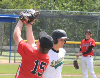 Dereck Arnzen catches an infield pop-up in the first Potlatch game as pitcher Daniel Mager looks on.