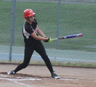 Hanna Ross gets an RBI single against Potlatch scoring Hailey Danly.