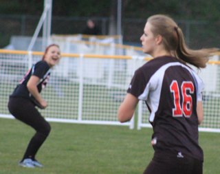 Centerfielder Kellie Heitman was happy that Holli Uhlorn, 16, made a catch in right field.
