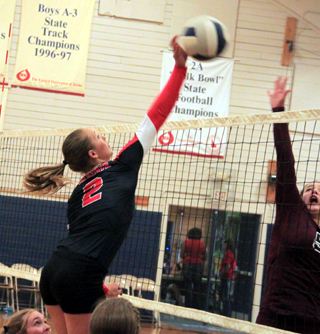 Mykaela McWilliams goes up for a spike against Kamiah at the Grangeville Jamboree.