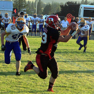 Calvin Hinkelman catches a pass against Salmon River.