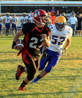 Calvin Hinkelman runs with the ball.