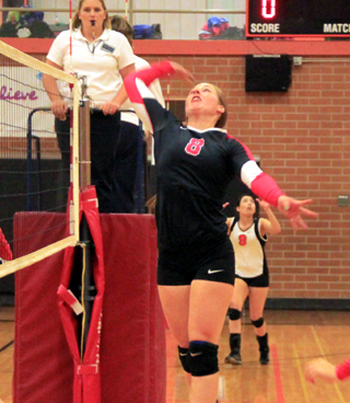 Hailey Danly gets a chance to hit the ball in the Asotin match.