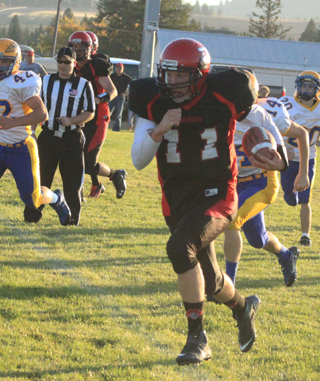 Jake Bruner has a full head of steam as he heads for open field on this run.