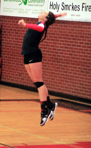 Shayla VonBargen goes up for one of her deadly jump serves. When she’s on with it, she can rack up a string of points.