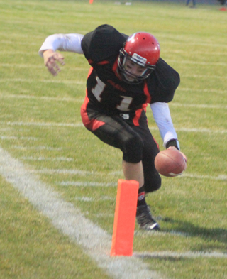 Jake Bruner was somehow called out of bounds inside the one on this play although  he hit the pylon with the ball.